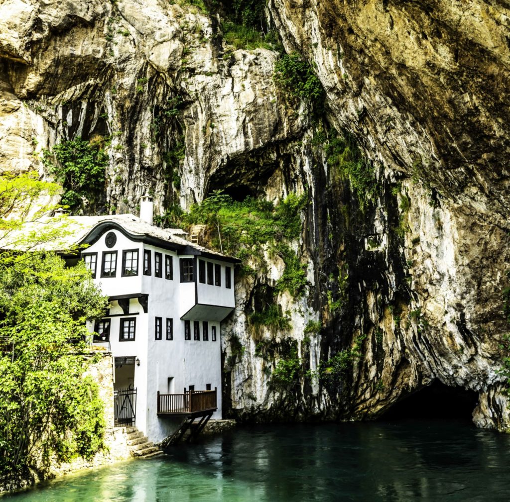 Blagaj Tekke, a Dervish monastery, enjoys a stunning location amidst karst landscape, next to the pristine Buna river. It is one of the best day trips from Mostar.